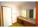 A bathroom with a double sink and storage space at 622 Enon Rd, Oxford, NC 27565
