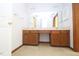 A brightly lit bathroom featuring a double sink and wood cabinets at 622 Enon Rd, Oxford, NC 27565