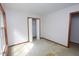 A simple bedroom with double closet and a window at 622 Enon Rd, Oxford, NC 27565