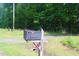 Rural mailbox with the number 622, on the edge of lush green acreage at 622 Enon Rd, Oxford, NC 27565