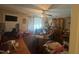 Dining room with ceiling fan and neutral carpet at 625 Revell Rd, Selma, NC 27576