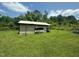 Storage shed on a grassy lot at 625 Revell Rd, Selma, NC 27576