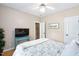 Bright bedroom with wood floors, plants, and decor at 6708 Wavcott Dr, Fuquay Varina, NC 27526