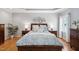 Charming bedroom with a trey ceiling, recessed lighting, and hardwood floors at 6708 Wavcott Dr, Fuquay Varina, NC 27526