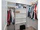 Well-organized closet with built-in shelving and ample hanging space for clothes and accessories at 6708 Wavcott Dr, Fuquay Varina, NC 27526
