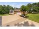Beautiful home featuring a spacious driveway, manicured lawn, and attached garage at 6708 Wavcott Dr, Fuquay Varina, NC 27526