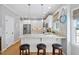 Kitchen with granite counters, center island, updated appliances and ample cabinet space at 6708 Wavcott Dr, Fuquay Varina, NC 27526
