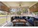 Inviting screened porch featuring comfortable seating and natural light at 6708 Wavcott Dr, Fuquay Varina, NC 27526