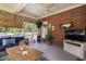 Relaxing screened porch boasts brick accents and a cozy atmosphere at 6708 Wavcott Dr, Fuquay Varina, NC 27526