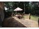 Outdoor wooden deck area with seating at 6717 Valley Dr, Raleigh, NC 27612