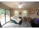 Cozy sitting area featuring a comfortable chair and a sliding glass door to the deck at 6717 Valley Dr, Raleigh, NC 27612