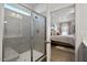 Modern bathroom with a tiled shower and a glimpse into the primary bedroom, providing a spa-like experience at 70 Freedom Heights Ln # 149, Smithfield, NC 27577
