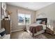 Cozy bedroom with ample natural light, wood floors, and neutral decor at 70 Freedom Heights Ln # 149, Smithfield, NC 27577