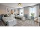 Bedroom showcasing two beds, carpet, and a neutral color scheme at 700 Ben Ledi Ct, Raleigh, NC 27603