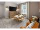 Playroom featuring seating, table, television and neutral color scheme at 700 Ben Ledi Ct, Raleigh, NC 27603