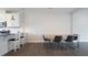 Cozy dining area featuring bar stool seating and modern pendant lighting at 713 Traditions Grande Blvd, Wake Forest, NC 27587