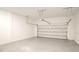 View of empty attached garage at 713 Traditions Grande Blvd, Wake Forest, NC 27587