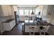 Well-lit kitchen featuring a center island, granite counters, and stainless steel appliances at 713 Traditions Grande Blvd, Wake Forest, NC 27587