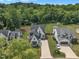 An aerial view of a beautiful home in a neighborhood with lush green trees at 800 Wilcox St, Raleigh, NC 27607