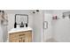 Chic bathroom with a modern vanity, minimalist mirror, and a glass-enclosed shower at 800 Wilcox St, Raleigh, NC 27607