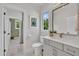 This modern bathroom features a double vanity and a stylish design, exuding comfort and convenience at 800 Wilcox St, Raleigh, NC 27607