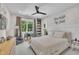 Charming bedroom with unique wallpaper, bright windows, and a cozy atmosphere at 800 Wilcox St, Raleigh, NC 27607