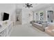 Well-lit bonus room featuring a comfortable couch and ample space for entertaining and leisure activities at 800 Wilcox St, Raleigh, NC 27607