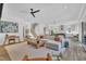 Spacious living room showcasing hardwood floors, an open layout, and an abundance of natural light at 800 Wilcox St, Raleigh, NC 27607