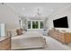 Spacious main bedroom boasts large windows, soft carpeting, and modern decor at 800 Wilcox St, Raleigh, NC 27607