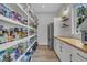 Walk-in pantry with generous shelving and ample storage space at 800 Wilcox St, Raleigh, NC 27607