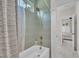 This bathroom features a shower with attractive green tiling and modern shower fixtures at 800 Wilcox St, Raleigh, NC 27607