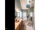 Bathroom featuring a garden tub, double sink vanity, and a separate shower at 820 Parkridge Dr, Clayton, NC 27527