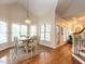 Charming dining area with many windows providing natural light and a lovely view at 820 Parkridge Dr, Clayton, NC 27527
