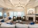 Comfortable living room with coffered ceilings, fireplace and lots of natural light at 820 Parkridge Dr, Clayton, NC 27527