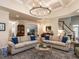 Open living room with hardwood floors, coffered ceilings and lots of natural light at 820 Parkridge Dr, Clayton, NC 27527