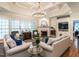 Spacious living room with coffered ceilings, fireplace and lots of natural light at 820 Parkridge Dr, Clayton, NC 27527