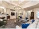 Spacious living room featuring a coffered ceiling, fireplace, and stylish decor at 820 Parkridge Dr, Clayton, NC 27527