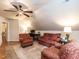 Cozy living room with a ceiling fan and a mixture of patterned furniture at 820 Parkridge Dr, Clayton, NC 27527