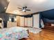 Spacious main bedroom with ample closet space and wood flooring at 820 Parkridge Dr, Clayton, NC 27527