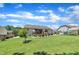 Extensive backyard featuring lush lawn, landscaped beds, and outdoor patio spaces at 85 Willard Wood Run, Benson, NC 27504