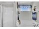 Relaxing bathtub with a separate shower and a window with natural light at 85 Willard Wood Run, Benson, NC 27504