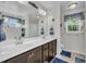Bathroom with double sink vanity, large mirror, and nice counter space at 85 Willard Wood Run, Benson, NC 27504