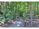 Wooded area with decorative ornament among the trees at 85 Willard Wood Run, Benson, NC 27504