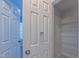 Organized bedroom closet showcasing wire shelving and ample storage space at 916 Woodside Park Ln, Durham, NC 27704