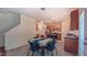 Charming eat-in kitchen featuring a cozy dining area with a stylish light fixture, adjacent to kitchen at 916 Woodside Park Ln, Durham, NC 27704