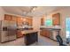 Modern kitchen with stainless steel appliances and plenty of counter space at 916 Woodside Park Ln, Durham, NC 27704