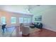 Cozy living room with hardwood floors and a view of the outdoor backyard at 916 Woodside Park Ln, Durham, NC 27704