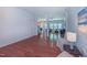 Open-concept living room showcasing hardwood floors and a connected layout at 916 Woodside Park Ln, Durham, NC 27704