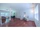 Spacious living room with gleaming hardwood floors and lots of natural light at 916 Woodside Park Ln, Durham, NC 27704