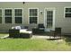 Inviting patio with comfortable seating, perfect for outdoor relaxation and entertaining at 916 Woodside Park Ln, Durham, NC 27704